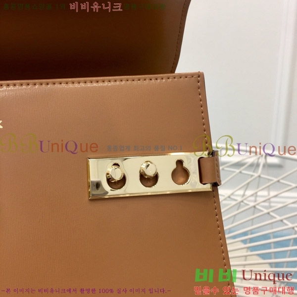 # Ʈ  MM TP0028-203