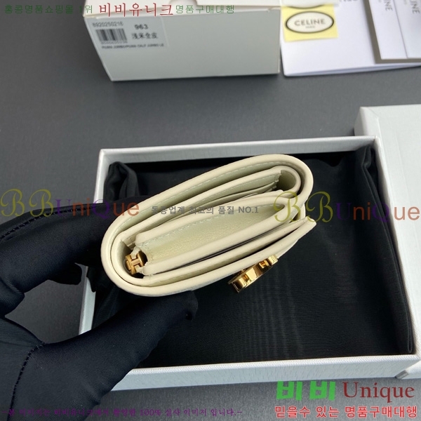 # Ƹ   10M963-103