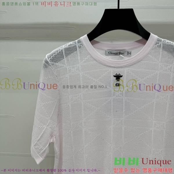    Ƽ DOI112077-23